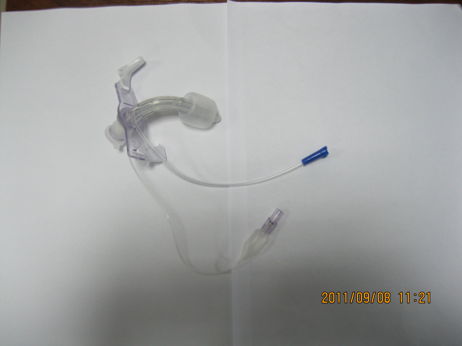 Tracheostomy tube with suction tube